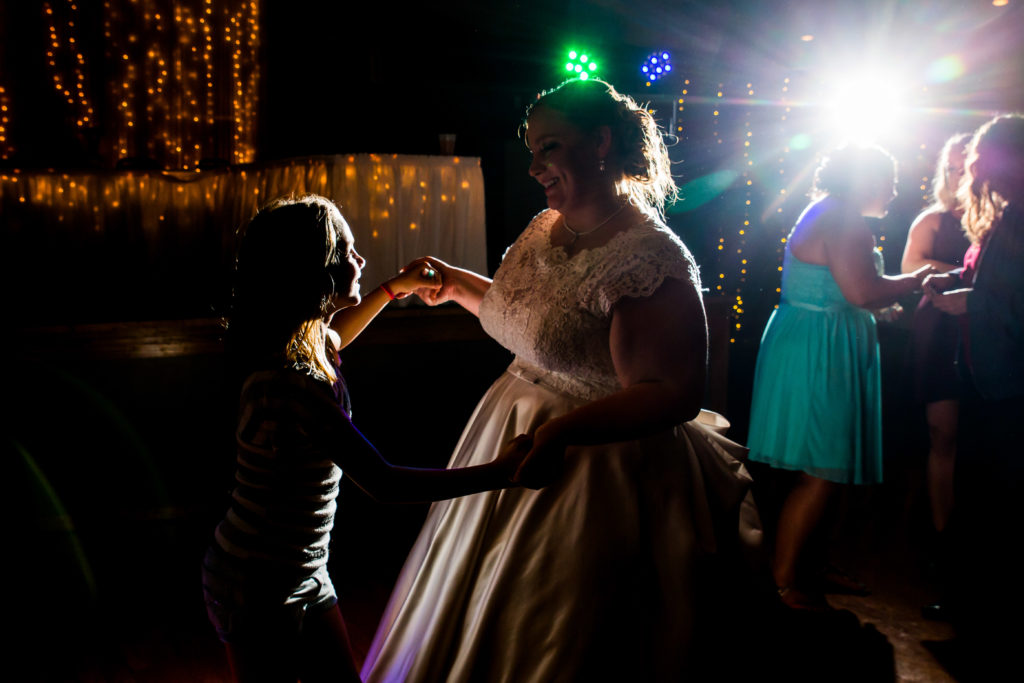 best candid photo - quad cities wedding photographer - wedding photographer quad cities - bride dancing